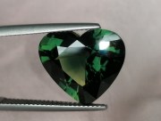 Gemstone with Certificate: 14.25 carats heart shape green sapphire nicely cut and perfectly clean. 