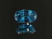 Pill shaped blue Zircon cushion - pretty wide while shallow, best value affordable zircon gem with sky blue C+ to B- color grade. 