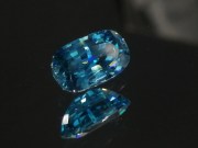 Pill shaped blue Zircon cushion - pretty wide while shallow, best value affordable zircon gem with sky blue C+ to B- color grade. 