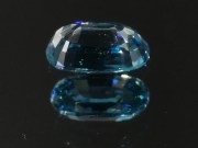 Pill shaped blue Zircon cushion - pretty wide while shallow, best value affordable zircon gem with sky blue C+ to B- color grade. 