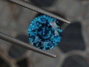 Wide blue Zircon,very clean and shiny, round cut 10mm+