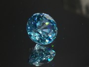 Wide blue Zircon,very clean and shiny, round cut 10mm+