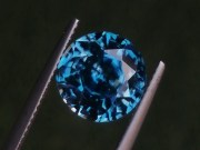 Wide blue Zircon,very clean and shiny, round cut 10mm+