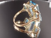 Purchase large emerald cut blue Zircon bi-color gemstone white and blue. 