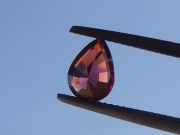 Pear shape sweet pink, peach and terracotta colors garnet from Tanzania. 