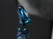 Grade AAA color, rare extremely high hue fancy tapered baguette / trapezoid natural blue zircon of 6.59ct