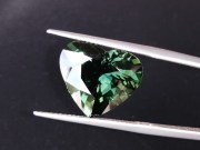 14.25 carats heart shape green sapphire nicely cut and perfectly clean. 