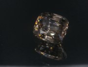 Large though affordable 12 carats untreated yellow orangish beige cushion shiny natural Zircon from Pailin Cambodia. 