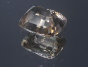 Large though affordable 12 carats untreated yellow orangish beige cushion shiny natural Zircon from Pailin Cambodia. 