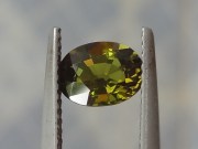 Olive green Tourmaline for sale faceted in oval. 