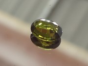 Olive green Tourmaline for sale faceted in oval. 