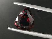 Deep burgundy red to purple Garnet cut in wide pear drop for a pendant. 