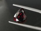 Deep burgundy red to purple Garnet cut in wide pear drop for a pendant. 