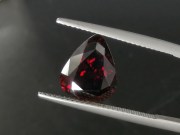 Deep burgundy red to purple Garnet cut in wide pear drop for a pendant. 