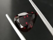 Deep burgundy red to purple Garnet cut in wide pear drop for a pendant. 