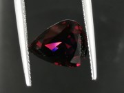 Deep burgundy red to purple Garnet cut in wide pear drop for a pendant. 