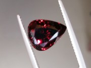 Deep burgundy red to purple Garnet cut in wide pear drop for a pendant. 