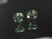 Pair of natural blue green yellow Zircon oval calibrated at 6mm by 8mm from Cambodia