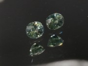 Pair of natural blue green yellow Zircon oval calibrated at 6mm by 8mm from Cambodia