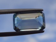 Purchase large emerald cut blue Zircon bi-color gemstone white and blue. 