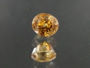 Sharp and vivid orange oval natural Zircon from Cambodia