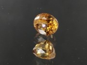 Sharp and vivid orange oval natural Zircon from Cambodia