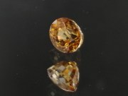 Sharp and vivid orange oval natural Zircon from Cambodia