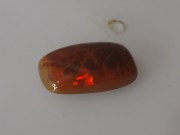 Brown Opal with Vivid Red Flashes 2.555ct