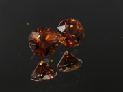 6.5mm wide calibrated pair of Hyacinth deep reddish orange natural zircon cut in round brilliant shape for earrings or studs jewelry