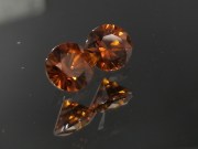 6.5mm wide calibrated pair of Hyacinth deep reddish orange natural zircon cut in round brilliant shape for earrings or studs jewelry