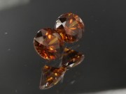 6.5mm wide calibrated pair of Hyacinth deep reddish orange natural zircon cut in round brilliant shape for earrings or studs jewelry