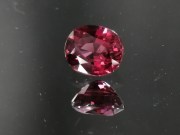 Beautiful oval Rhodolite Garnet discounted on sale due to 1 inclusion and 1 chip that are not visible to the naked eye. 