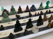 Buddha and Ganesha Carvings made of Tektite, Amethyst, Topaz, Ruby, Mother of Pearl, Marble, Bone, Ivory and more. 