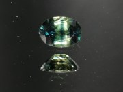 1 Carat Fancy Multicolor Sapphire Blue Green Yellow Stripes Oval Sapphire from Thailand. 