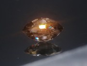 Marquise cut affordable 4 carats untreated orangish beige shiny natural Zircon from Pailin Cambodia. 