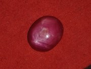 Quality red star Ruby cabochon of 13 carats for sale. 