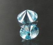 Discounted precision diamond/brilliant cut blue zircon, very clean and shiny