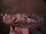 Large specimen of a ruby crystal cluster for dragon head carving