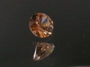 Precision brilliant cut orange to salmon zircon, perfectly cut from professional gemstones supplier