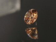 Precision brilliant cut orange to salmon zircon, perfectly cut from professional gemstones supplier