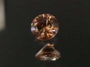 Precision brilliant cut orange to salmon zircon, perfectly cut from professional gemstones supplier