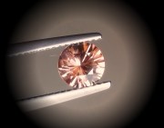 Precision 6.5mm brilliant cut orange to salmon zircon, perfectly cut from professional lapidary. 