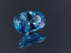 Large blue Zircon cushion - very wide while shallow, a big zircon gem with sky blue C+ grade color