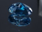 Large blue Zircon cushion - very wide while shallow, a big zircon gem with sky blue C+ grade color