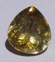 Large cheap and shiny pear shape yellow Tourmaline. 